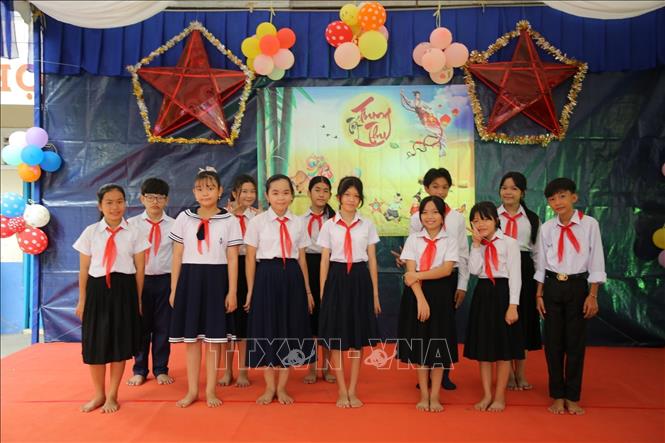 Các em học sinh Trường Tiểu học Hữu nghị Khmer-Việt Nam Tân Tiến Phnom Penh.  Ảnh: TTXVN