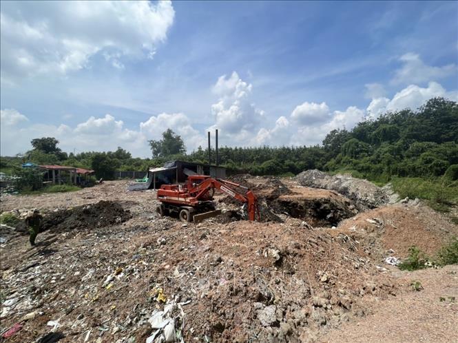 Hiện trường nơi cơ quan chức năng phát hiện ra vụ việc. Ảnh: TTXVN phát 