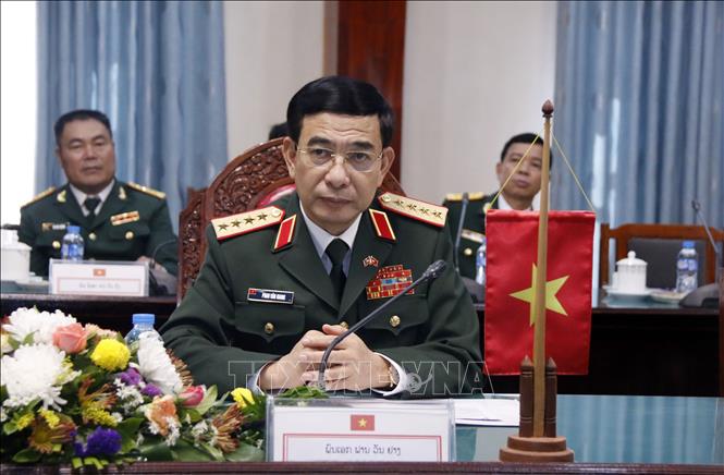 Trong ảnh: Đại tướng Phan Văn Giang tại cuộc hội đàm với đoàn Bộ Quốc phòng Lào. Ảnh: Phạm Kiên. Phóng viên TTXVN tại Lào