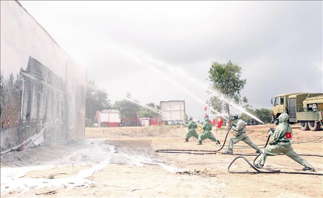Vietnamese, Lao, and Cambodian military officers and soldiers participate in joint rescue exercise in Vientiane. VNA Photo