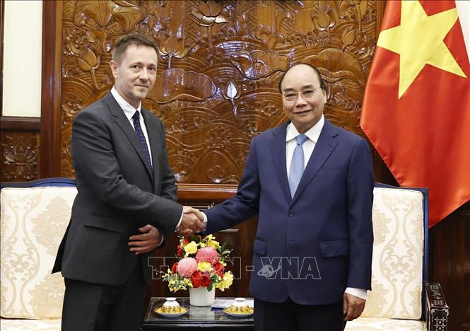 Chủ tịch nước Nguyễn Xuân Phúc tiếp Đại sứ Hungary Tibor Baloghdi. Ảnh: Thống Nhất- TTXVN
