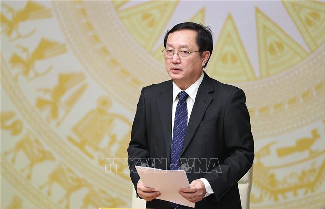 Bộ trưởng Bộ Khoa học và Công nghệ Huỳnh Thành Đạt báo cáo. Ảnh: Dương Giang-TTXVN
