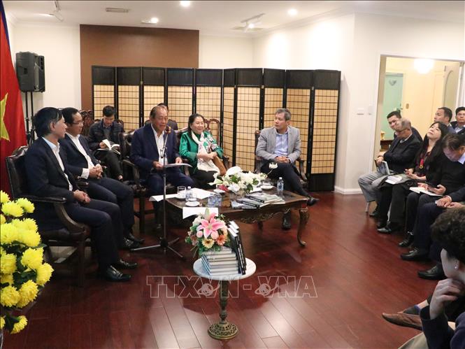 Quang cảnh buổi giới thiệu tập thơ. Ảnh: Nguyễn Minh-TTXVN