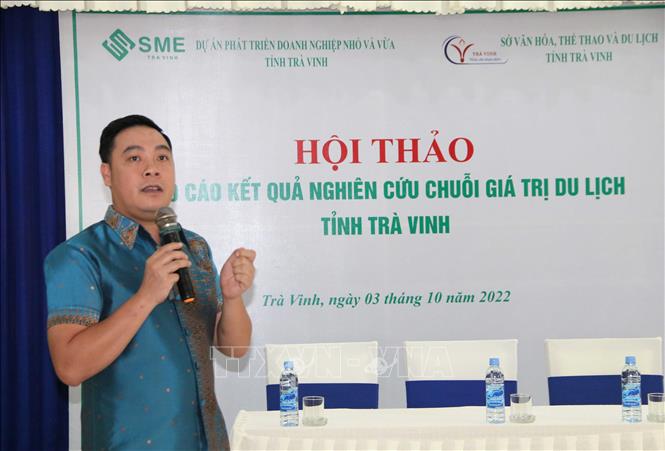 Ông Dương Đức Minh, Phó Viện trưởng Viện Nghiên cứu Phát triển kinh tế và Du lịch báo cáo kết quả nghiên cứu. Ảnh: Thanh Hòa - TTXVN