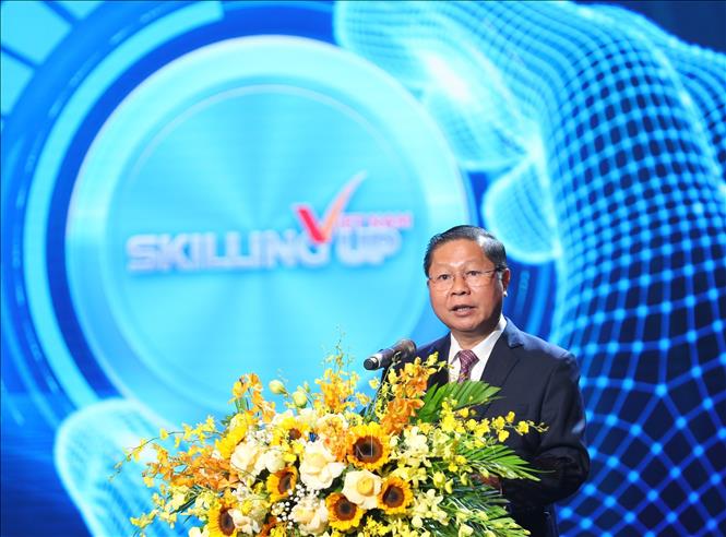 Thứ trưởng Bộ Lao động - Thương binh và Xã hội Lê Tấn Dũng phát biểu khai mạc. Ảnh: Hoàng Hiếu - TTXVN