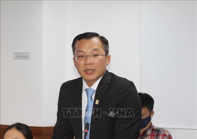 Ông Hoàng Minh Hoàn, Phó Tổng giám đốc phụ trách điều hành SCB khẳng định ngân hàng đã kiểm soát tình hình, thanh khoản ổn định. Ảnh: Hứa Chung - TTXVN