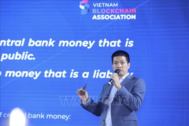 Vice President of the Vietnam Blockchain Association Phan Duc Trung speaks at the summit. VNA Photo: Minh Quyết