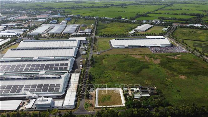 Năm 2022, An Giang phấn đấu thu hút ít nhất 15 dự án đầu tư vào sản xuất tại các KCN với tổng vốn đầu tư đạt trên 20.000 tỷ đồng. Ảnh: Vũ Sinh – TTXVN

