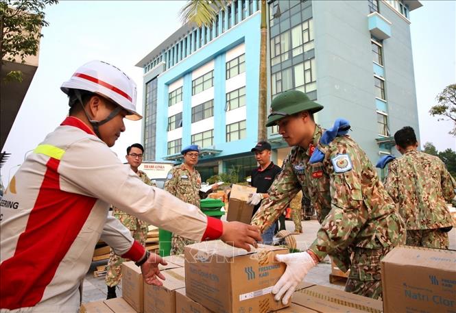  Lực lượng Bệnh viện dã chiến cấp 2 số 2 của Việt Nam tập kết trang thiết bị chuẩn bị lên đường tham gia Gìn giữ hoà bình Liên Hợp quốc (2019). Ảnh: Dương Giang - TTXVN