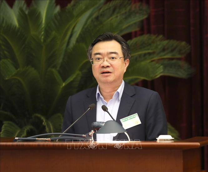 Đồng chí Nguyễn Thanh Nghị, Uỷ viên Trung ương Đảng, Bộ trưởng Bộ Xây dựng trình bày tham luận tại hội nghị. Ảnh: Phương Hoa - TTXVN