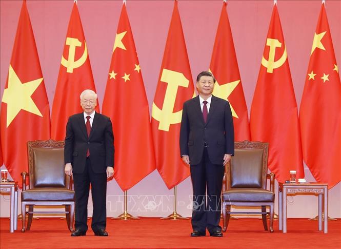 Tổng Bí thư, Chủ tịch Trung Quốc Tập Cận Bình và Tổng Bí thư Nguyễn Phú Trọng tại buổi lễ. Ảnh: Trí Dũng – TTXVN