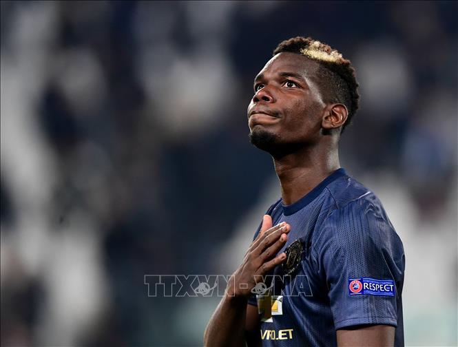 Trong ảnh (tư liệu): Cầu thủ Paul Pogba trong trận đấu giữa CLB Juventus và Manchester United tại giải UEFA Champions League ở Turin, Italy ngày 7/11/2018. Ảnh: AFP/TTXVN