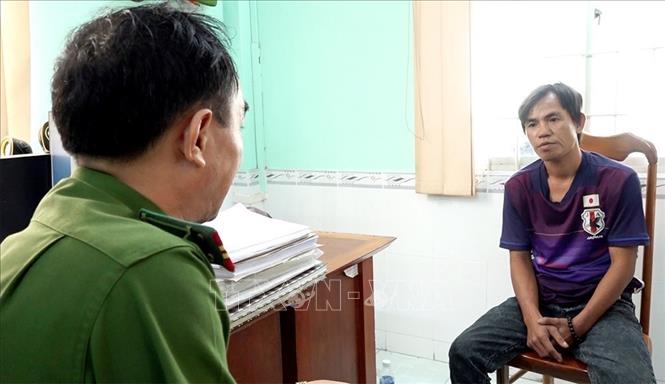 Trong ảnh: Đối tượng Trần Văn Nam tại cơ quan điều tra. Ảnh: TTXVN phát./.