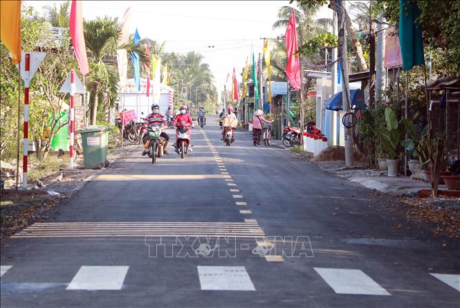 Trong ảnh: Tuyến đường liên xã Trung Hiệp - Trung Hiếu mới được khánh thành. Ảnh: Phạm Minh Tuấn-TTXVN