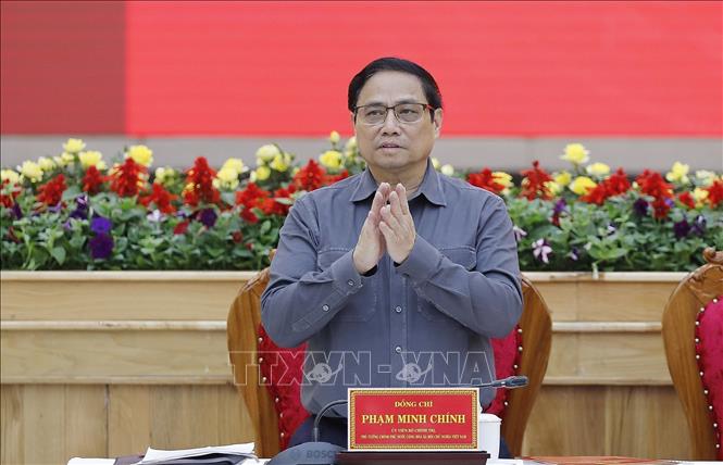 PM Pham Minh Chinh attends the meeting with the Standing Board of the Lam Dong province's Party Committee. VNA Photo: Dương Giang