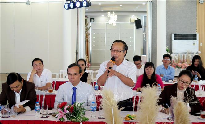 Trong ảnh: Các đại biểu thảo luận, trao đổi tại Tọa đàm. Ảnh: Lê Ngọc Phước - TTXVN
