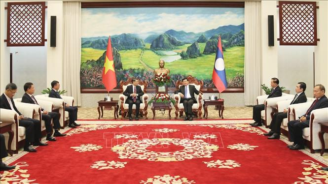 Tổng Bí thư, Chủ tịch nước Lào Thongloun Sisoulith tiếp đồng chí Lê Minh Hưng, Bí thư Trung ương Đảng, Chánh Văn phòng Trung ương. Ảnh: Phạm Kiên - Phóng viên TTXVN tại Lào