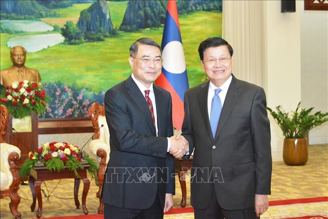Tổng Bí thư, Chủ tịch nước Lào Thongloun Sisoulith tiếp đồng chí Lê Minh Hưng, Bí thư Trung ương Đảng, Chánh Văn phòng Trung ương. Ảnh: Phạm Kiên - Phóng viên TTXVN tại Lào