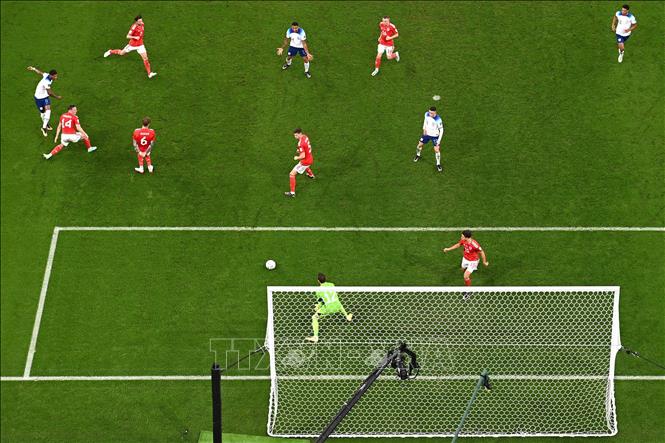 Trong ảnh: Tiền đạo Anh Marcus Rashford (trái) ghi bàn thắng thứ 3 cho tuyển Anh. Ảnh: AFP/TTXVN