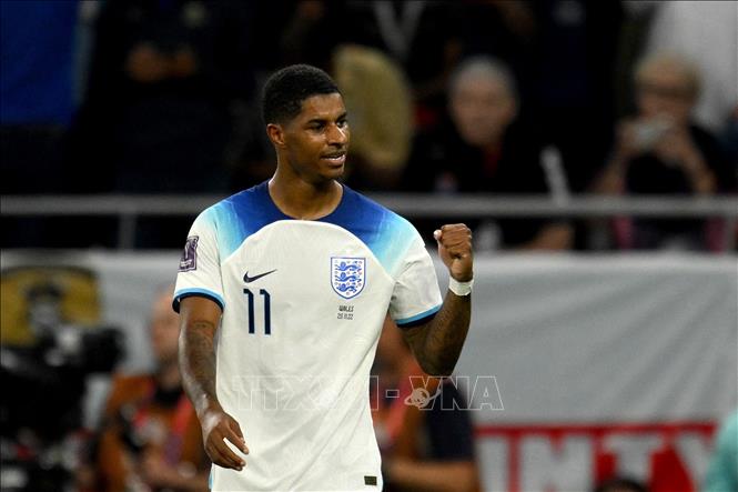 Trong ảnh: Tiền đạo Marcus Rashford ăn mừng sau khi ghi bàn thắng nâng tỷ số lên 3-0 cho tuyển Anh. Ảnh: AFP/TTXVN