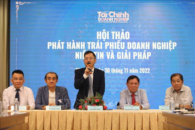 Ông Hà Khắc Minh, Tổng biên tập Tạp chí Tài chính Doanh nghiệp điều hành thảo luận tại hội thảo. Ảnh: Hứa Chung - TTXVN