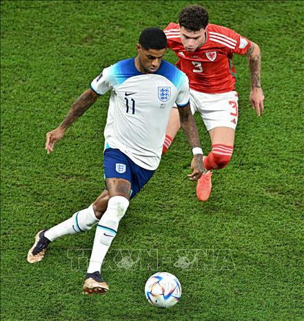 Trong ảnh: Marcus Rashford, đội tuyển Anh, trong trận đấu với đội tuyển Xứ Wales tại  World Cup 2022 ở Doha, Qatar, ngày 29/11/2022. Ảnh: THX/TTXVN