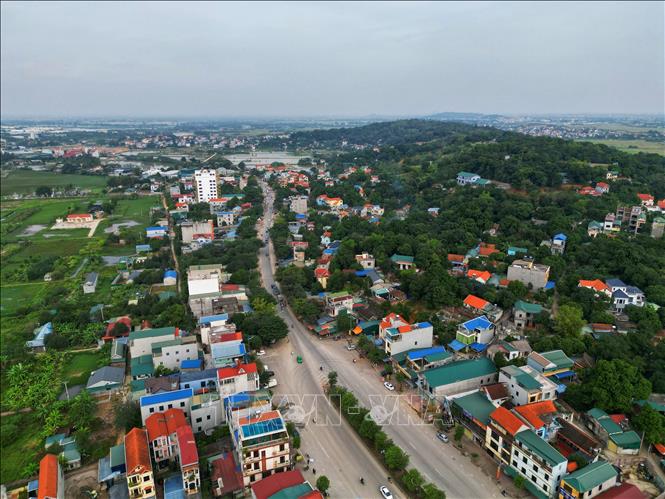 Trong ảnh: Đoạn Quốc lộ 6 chạy qua huyện Chương Mỹ, quận Hà Đông (Hà Nội). Ảnh: Tuấn Anh - TTXVN