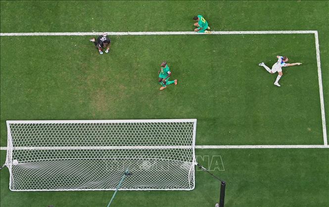 Tiền vệ Jordan Henderson (phải) ăn mừng sau ghi bàn thắng mở tỉ số cho Anh trước Senegal. Ảnh: AFP/ TTXVN