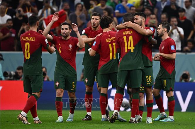 Niềm vui chiến thắng của các tuyển thủ Bồ Đào Nha. Ảnh: AFP/TTXVN