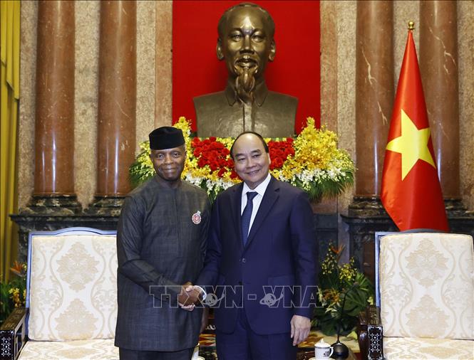 Chủ tịch nước Nguyễn Xuân Phúc tiếp Phó Tổng thống CHLB Nigeria Yemi Osinbajo. Ảnh: Thống Nhất- TTXVN
