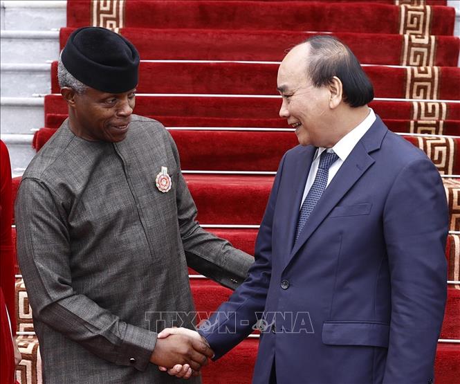 Chủ tịch nước Nguyễn Xuân Phúc tiếp Phó Tổng thống CHLB Nigeria Yemi Osinbajo. Ảnh: Thống Nhất- TTXVN