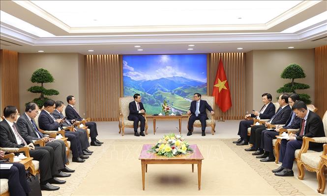 Thủ tướng Phạm Minh Chính tiếp Phó Thủ tướng, Bộ trưởng Ngoại giao Lào Saleumxay Kommasith. Ảnh: Dương Giang-TTXVN
