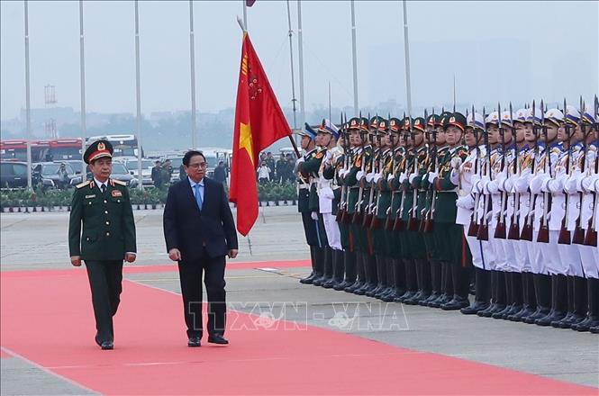 Thủ tướng Phạm Minh Chính đến dự Lễ khai mạc Triển lãm Quốc phòng quốc tế Việt Nam 2022. Ảnh: Trọng Đức - TTXVN