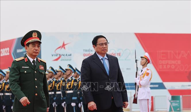Thủ tướng Phạm Minh Chính đến dự Lễ khai mạc Triển lãm Quốc phòng quốc tế Việt Nam 2022. Ảnh: Dương Giang - TTXVN
