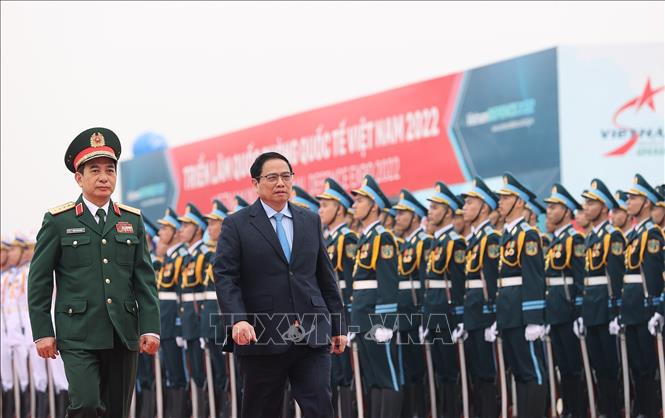 Thủ tướng Phạm Minh Chính đến dự Lễ khai mạc Triển lãm Quốc phòng quốc tế Việt Nam 2022. Ảnh: Dương Giang - TTXVN
