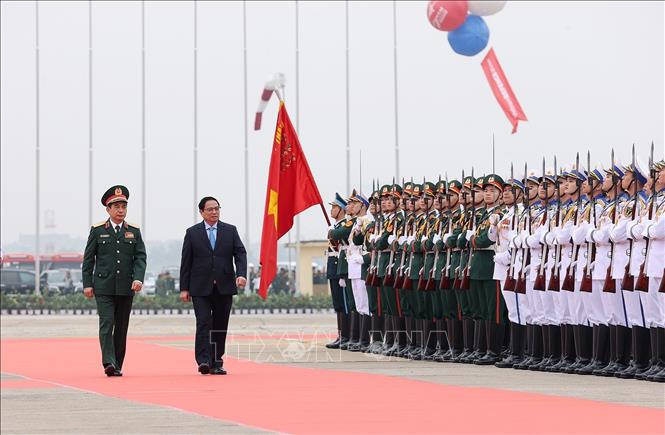Thủ tướng Phạm Minh Chính đến dự Lễ khai mạc Triển lãm Quốc phòng quốc tế Việt Nam 2022. Ảnh: Trọng Đức - TTXVN