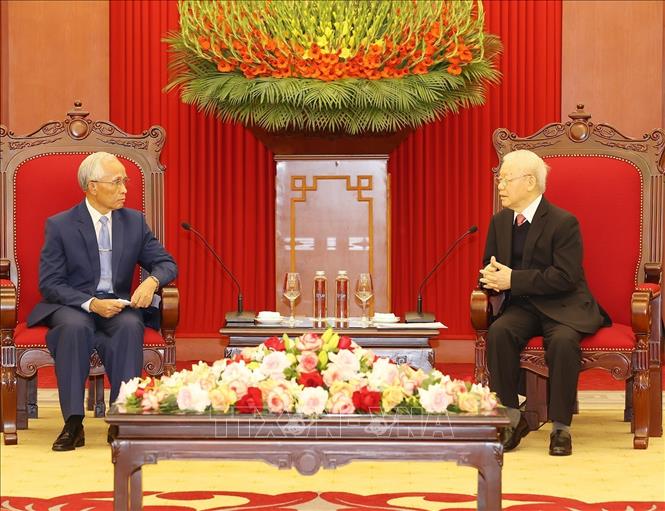 Tổng Bí thư Nguyễn Phú Trọng tiếp đồng chí Khamphan Pheuyavong, Bí thư Trung ương Đảng, Trưởng ban Tuyên huấn, Chủ tịch Hội đồng Lý luận Trung ương Đảng Nhân dân Cách mạng Lào. Ảnh: Trí Dũng - TTXVN