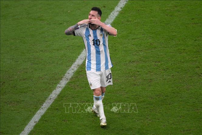 Tiền đạo Argentina Messi ăn mừng bàn thắng thứ 3 của đội nhà trước Croatia. Ảnh: AFP/TTXVN