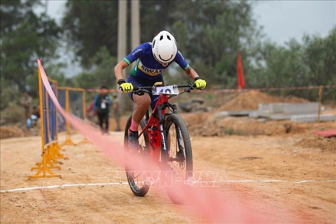 Trong ảnh: Những nỗ lực không biết mệt mỏi của Đinh Thị Như Quỳnh trên đường đua. Ảnh: Trọng Đạt-TTXVN