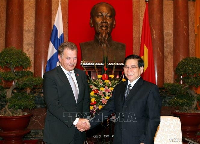 Chủ tịch nước Nguyễn Minh Triết tiếp Chủ tịch Quốc hội Cộng hoà Phần Lan Sauli Vainamo Niinisto thăm và làm việc tại Việt Nam (11/1/2010). Ảnh: Nguyễn Khang – TTXVN