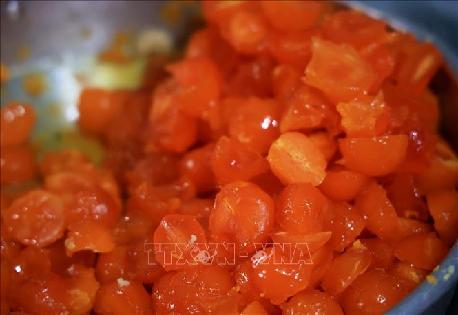 Salted egg yolks are one of the fillings for banh tet. VNA Photo: Hồng Đạt
