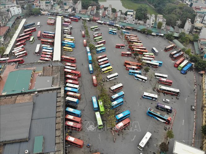 Bến xe Giáp Bát sẽ đón khoảng 600 xe đưa hành khách từ các tỉnh, thành phía Nam về Hà Nội (ảnh chụp lúc 12h50 ngày 26/1). Ảnh: Hoàng Hiếu - TTXVN 