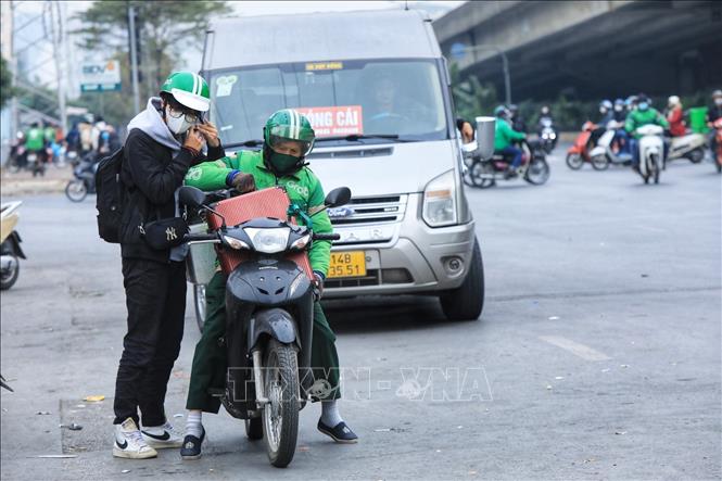 Người dân trở lại Thủ đô sau kỳ nghỉ Tết Nguyên đán (ảnh chụp lúc 15 giờ 15' tại Bến xe Mỹ Đình). Ảnh: Tuấn Anh - TTXVN