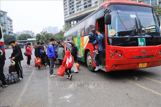 Người dân trở lại Thủ đô sau kỳ nghỉ Tết Nguyên đán (ảnh chụp lúc 15 giờ 15' tại Bến xe Mỹ Đình). Ảnh: Tuấn Anh - TTXVN
