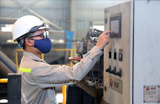 Trong ảnh: Không khí hoạt động sản xuất khẩn trương, nghiêm túc ngay từ những ngày đầu năm tại mỏ đồng Sin Quyền (Lào Cai). Ảnh: Quốc Khánh - TTXVN