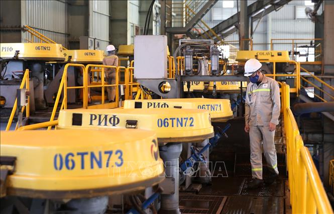Trong ảnh: Không khí hoạt động sản xuất khẩn trương, nghiêm túc ngay từ những ngày đầu năm tại mỏ đồng Sin Quyền (Lào Cai). Ảnh: Quốc Khánh - TTXVN