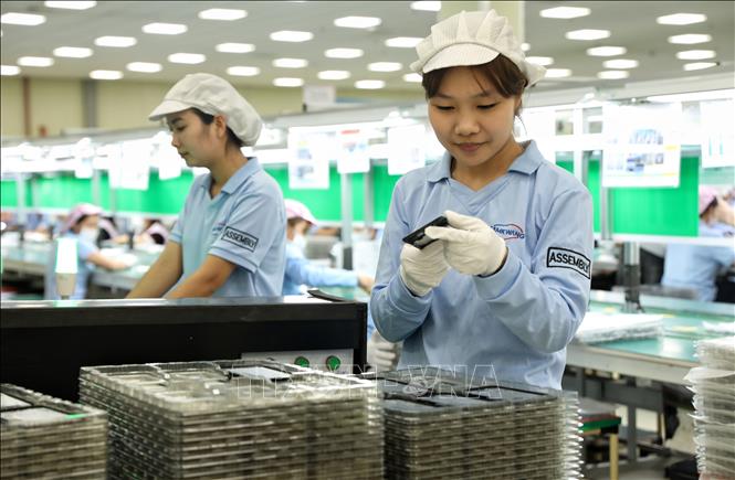 Production of the Korean-invested Samkwang Vina Co. Ltd at the Quang Chau IP, the northern province of Bac Giang. VNA Photo: Danh Lam