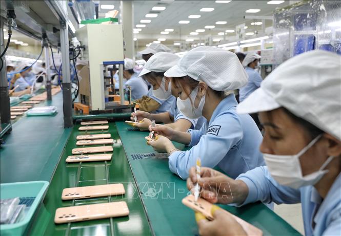 Production of the Korean-invested Samkwang Vina Co. Ltd at the Quang Chau IP, the northern province of Bac Giang. VNA Photo: Danh Lam