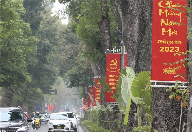 Hà Nội trang hoàng đường phố chào mừng 93 năm ngày thành lập Đảng - Ảnh ...
