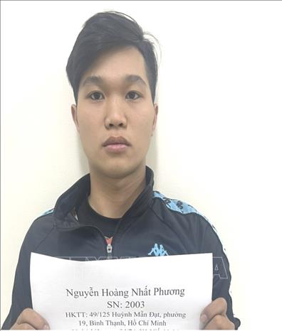 Đối tượng Nguyễn Hoàng Nhất Phương tại cơ quan Công an huyện Nhơn Trạch. Ảnh: TTXVN phát